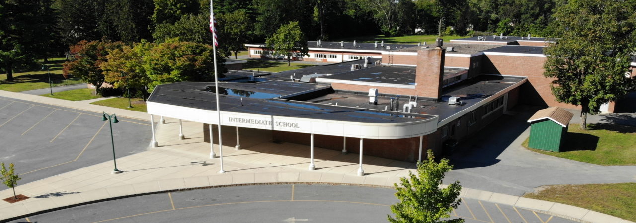 photo shows aerial view of intermediate school in sun outside view