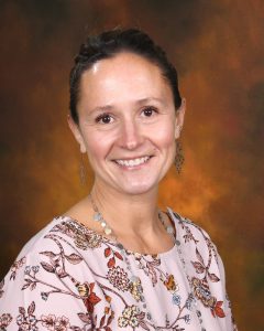 photo shows woman smiling