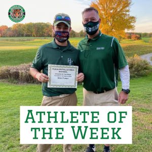 Athlete of the Week  - athlete and a teacher pose for a photo with masks and a certificate