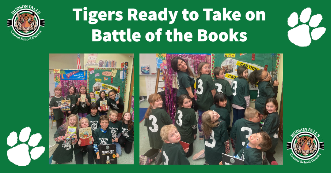 group photo showing students displaying their books and back of their shirts with a number 3, representing their 3rd grade battle of the book team
