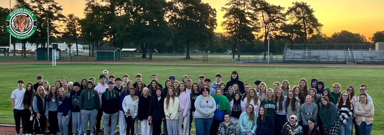The class of 2026 on the football field at Sunrise